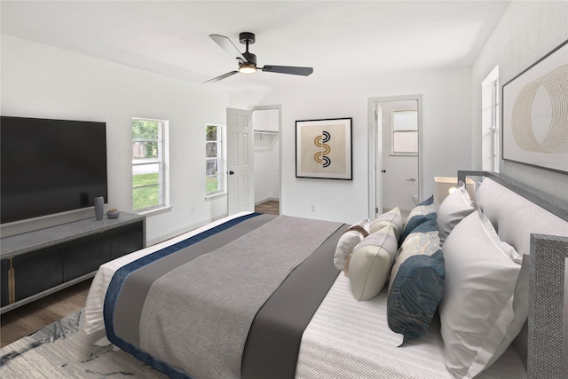 3812 David Ln, Forest Hill, TX 76119 - bedroom featuring ceiling fan, wood finished floors, and a spacious closet