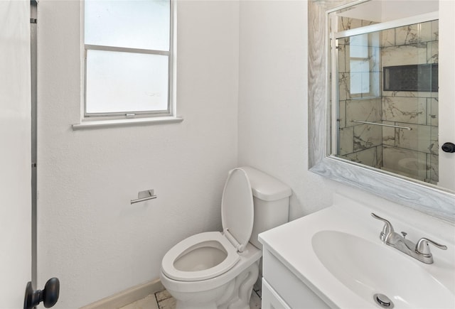 3812 David Ln, Forest Hill, TX 76119 - bathroom with toilet, vanity, and a stall shower