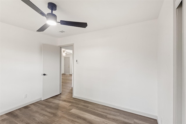 3812 David Ln, Forest Hill, TX 76119 - spare room with a ceiling fan, wood finished floors, and baseboards