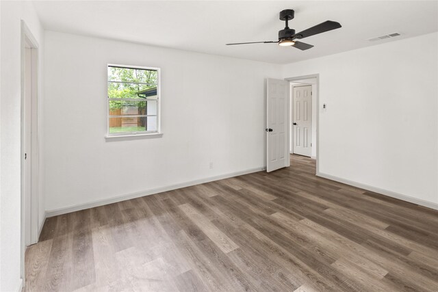 3812 David Ln, Forest Hill, TX 76119 - unfurnished room featuring wood finished floors, ceiling fan, and baseboards