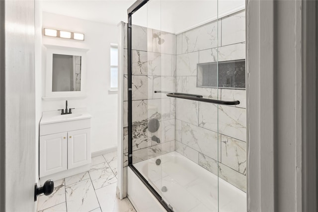 3812 David Ln, Forest Hill, TX 76119 - bathroom featuring marble look tiles, combined bath / shower with glass door, vanity, and baseboards