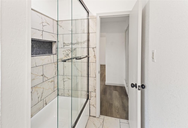 3812 David Ln, Forest Hill, TX 76119 - full bathroom featuring combined bath / shower with glass door and baseboards