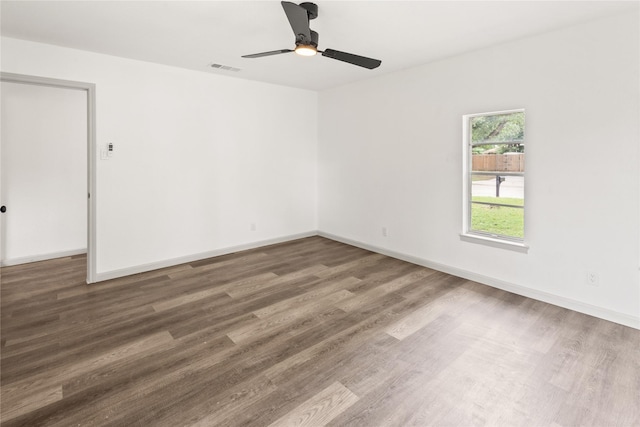 3812 David Ln, Forest Hill, TX 76119 - unfurnished room with ceiling fan, wood finished floors, and baseboards