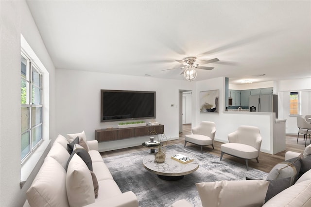 3812 David Ln, Forest Hill, TX 76119 - living area with healthy amount of natural light, wood finished floors, and a ceiling fan