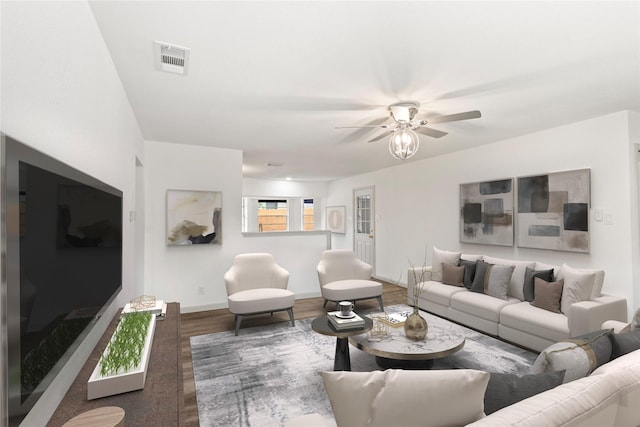 3812 David Ln, Forest Hill, TX 76119 - living room with wood finished floors, a ceiling fan, and baseboards