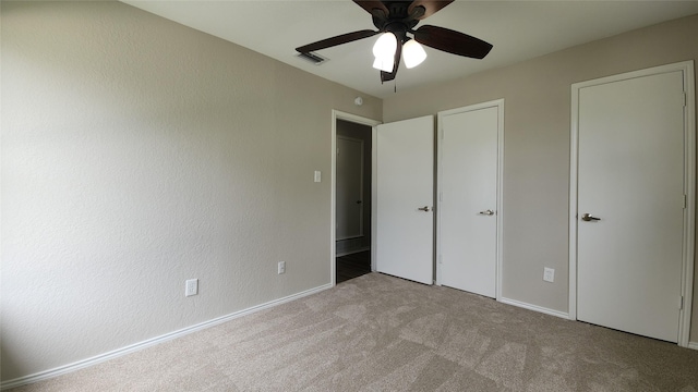 3308 29th St, Fort Worth, TX 76111 - unfurnished bedroom featuring carpet floors, baseboards, and a ceiling fan