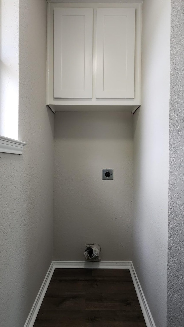 3308 29th St, Fort Worth, TX 76111 - washroom with hookup for an electric dryer, wood finished floors, and baseboards