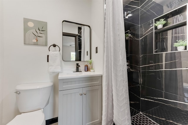 3467 Binyon St, Fort Worth, TX 76133 - bathroom with toilet, a tile shower, and vanity