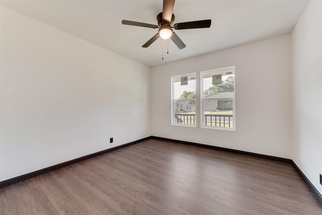 3467 Binyon St, Fort Worth, TX 76133 - empty room with wood finished floors, ceiling fan, and baseboards
