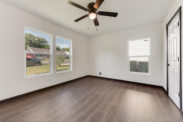 3467 Binyon St, Fort Worth, TX 76133 - spare room featuring dark wood-style flooring, ceiling fan, and baseboards