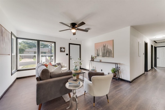 3467 Binyon St, Fort Worth, TX 76133 - living area featuring wood finished floors, ceiling fan, and baseboards