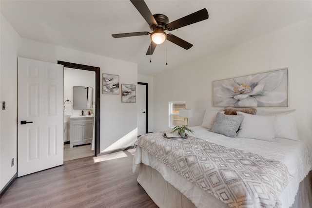 3467 Binyon St, Fort Worth, TX 76133 - bedroom featuring wood finished floors, ensuite bathroom, a ceiling fan, and baseboards