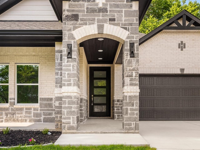 4416 Green Acres Ct, Arlington, TX 76017 - doorway to property featuring a garage, driveway, and stone siding