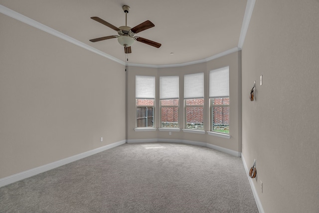 7819 Uxbridge Dr, Irving, TX 75063 - unfurnished room featuring ornamental molding, carpet flooring, ceiling fan, and baseboards