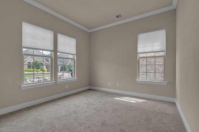 7819 Uxbridge Dr, Irving, TX 75063 - spare room with ornamental molding, carpet floors, and baseboards