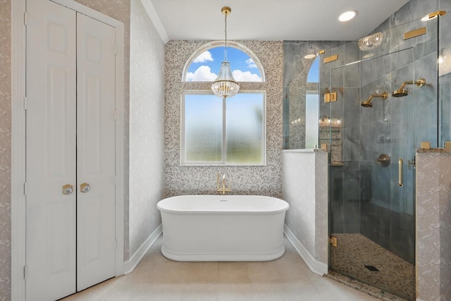 1000 Van Zandt Ct, Haslet, TX 76052 - full bath featuring a shower stall, a freestanding tub, a closet, a chandelier, and tile patterned flooring