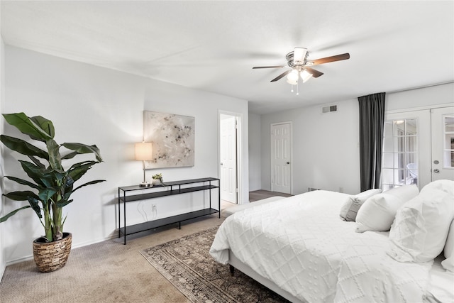 3309 Citation Dr, Dallas, TX 75229 - bedroom with french doors, carpet floors, ceiling fan, and baseboards