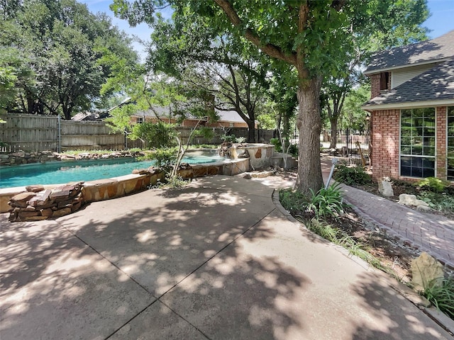 6029 Bellaire Dr, Benbrook, TX 76132 - view of pool featuring a patio, a fenced backyard, and a hot tub