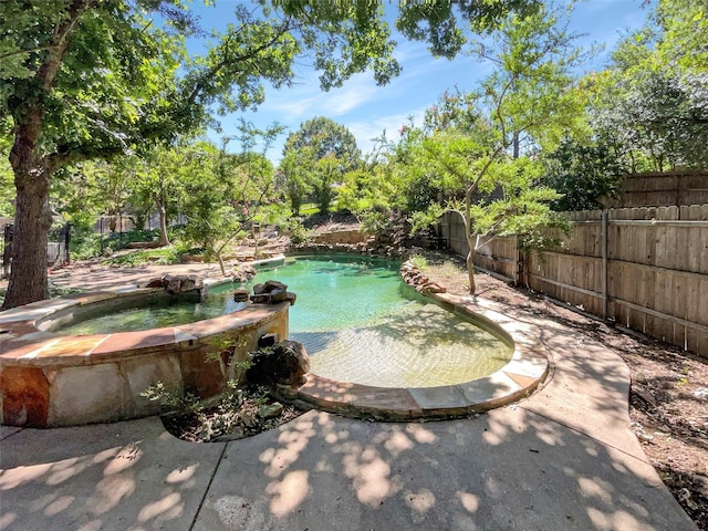 6029 Bellaire Dr, Benbrook, TX 76132 - view of pool with a fenced backyard and a pool with connected hot tub