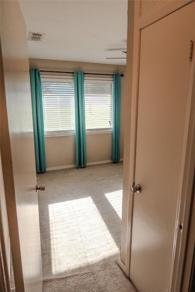 248 Ellis St, Rusk, TX 75785 - hall featuring carpet and baseboards