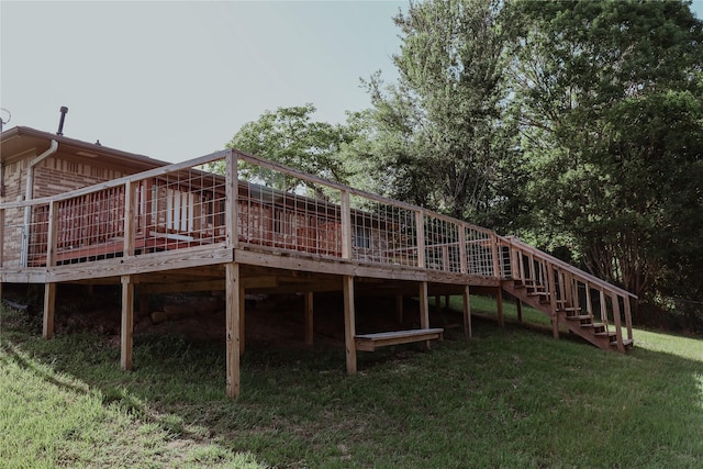 248 Ellis St, Rusk, TX 75785 - rear view of house with stairs, a lawn, and a wooden deck