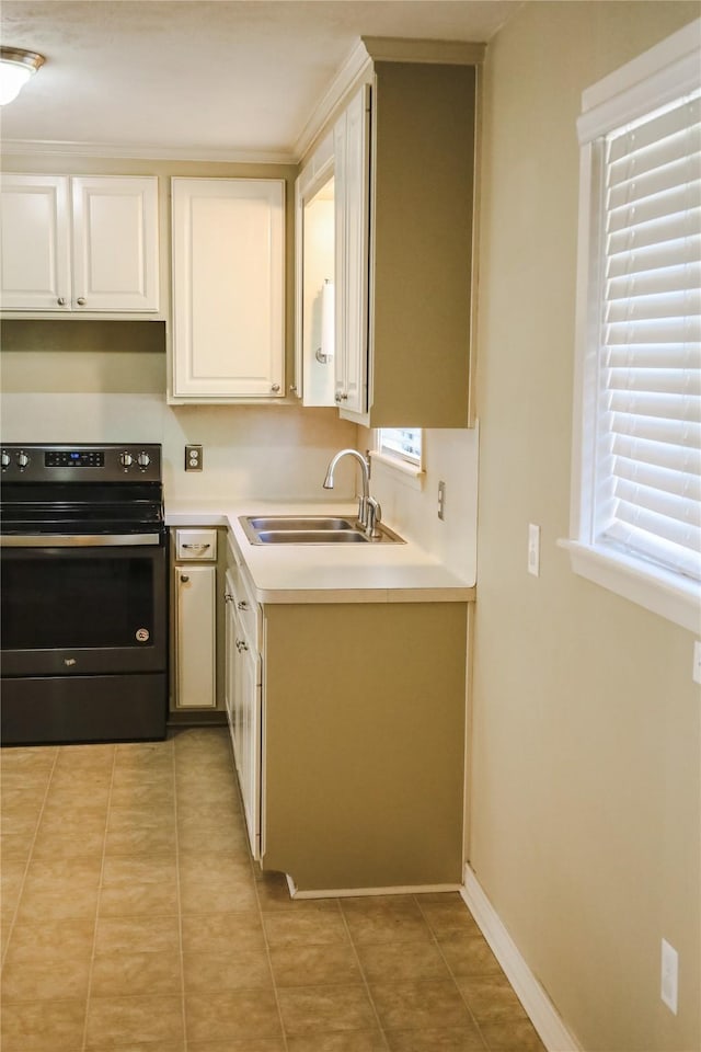 248 Ellis St, Rusk, TX 75785 - kitchen featuring electric range, a sink, healthy amount of natural light, and white cabinets