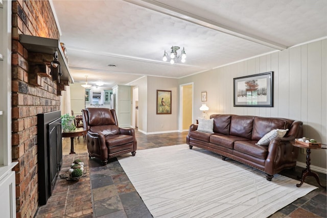 1113 Stanley St, Denton, TX 76201 - living area featuring stone tile floors, a fireplace, and baseboards