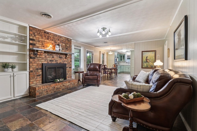 1113 Stanley St, Denton, TX 76201 - living room with a brick fireplace and stone tile floors