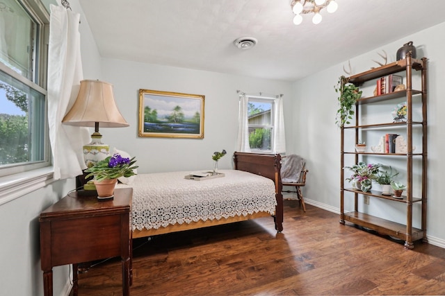 1113 Stanley St, Denton, TX 76201 - bedroom featuring wood finished floors and baseboards