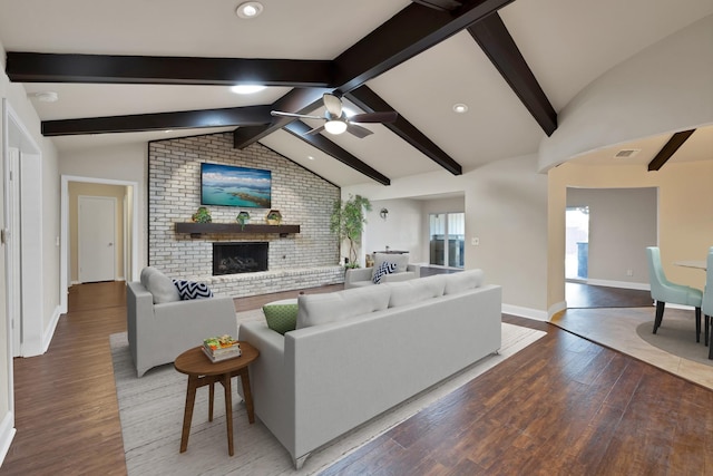 2612 Windsor Pl, Plano, TX 75075 - living room with a fireplace, wood finished floors, a ceiling fan, baseboards, and recessed lighting