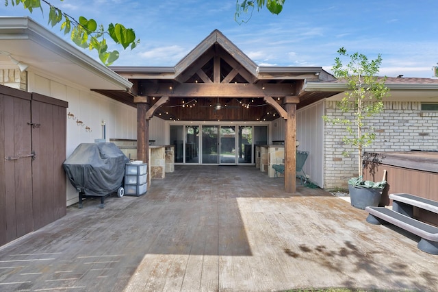 2612 Windsor Pl, Plano, TX 75075 - wooden deck with a patio area and a hot tub