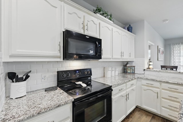 2408 Charisma Dr, Fort Worth, TX 76131 - kitchen with black appliances, white cabinetry, tasteful backsplash, and light stone countertops