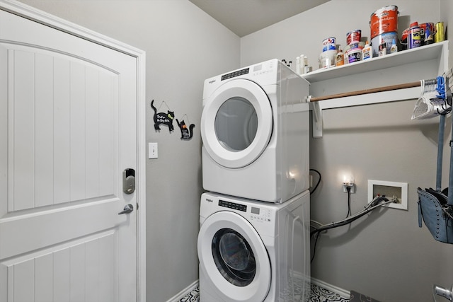 2408 Charisma Dr, Fort Worth, TX 76131 - laundry area with stacked washer / dryer and baseboards