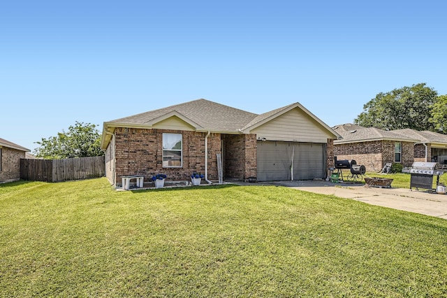1806 Willowbrook Dr, Terrell, TX 75160 - single story home featuring concrete driveway, an attached garage, brick siding, a shingled roof, and a fire pit
