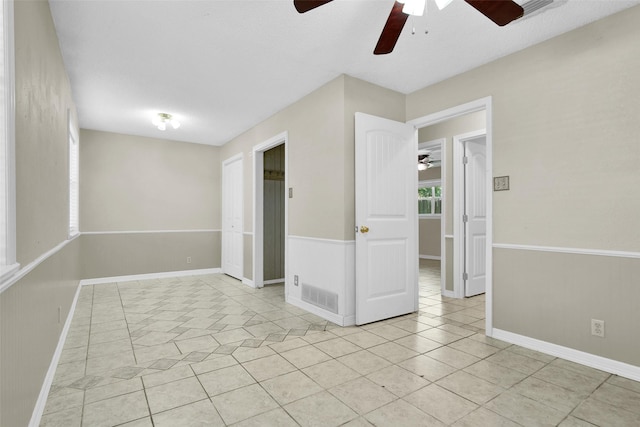 106 King Ave, Howe, TX 75459 - spare room with ceiling fan, baseboards, and light tile patterned floors
