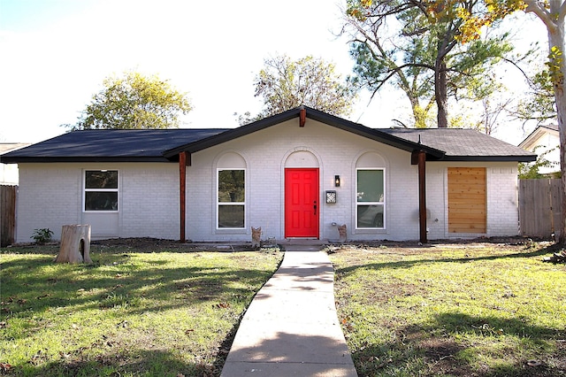 810 Laguna Dr, Garland, TX 75043 - view of front of home with brick siding and roof with shingles