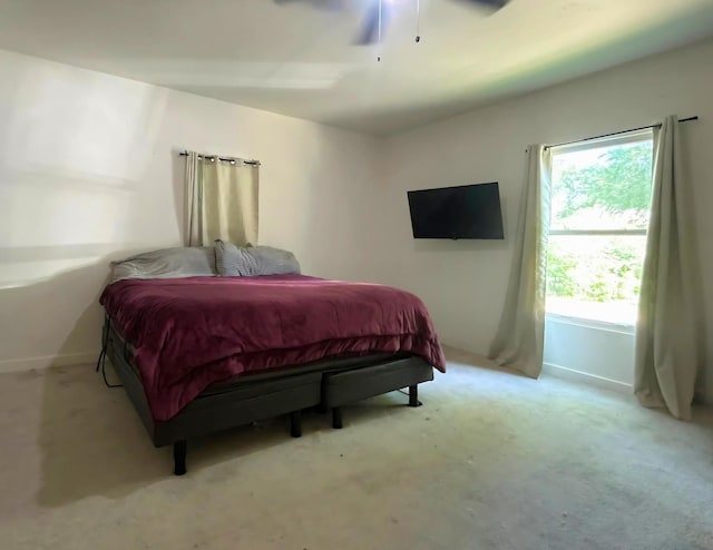 2300 Stoneman St, Dallas, TX 75215 - bedroom featuring carpet, a ceiling fan, and baseboards