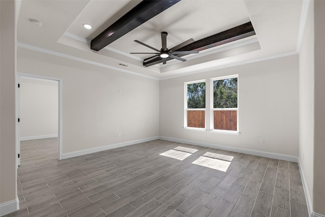 2325 Neches St, Granbury, TX 76048 - spare room featuring a raised ceiling, ceiling fan, wood finished floors, crown molding, and beamed ceiling