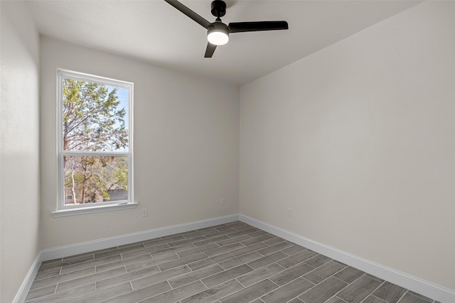 2325 Neches St, Granbury, TX 76048 - empty room featuring wood finished floors, baseboards, and ceiling fan