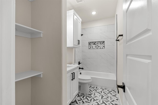 2325 Neches St, Granbury, TX 76048 - bathroom with toilet, vanity, shower / washtub combination, and recessed lighting