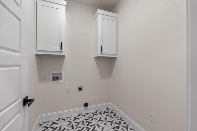 2325 Neches St, Granbury, TX 76048 - laundry area with cabinet space, electric dryer hookup, baseboards, washer hookup, and hookup for a gas dryer