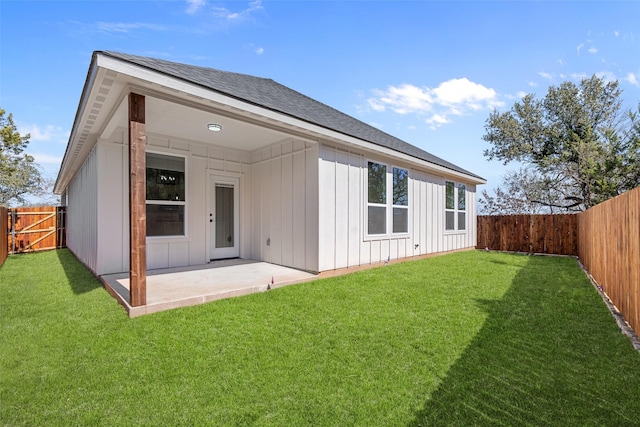 2325 Neches St, Granbury, TX 76048 - rear view of property with board and batten siding, a patio area, and roof with shingles