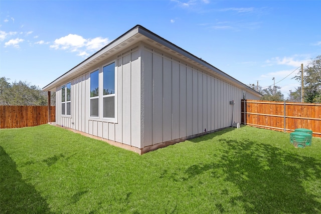 2325 Neches St, Granbury, TX 76048 - view of property exterior with board and batten siding