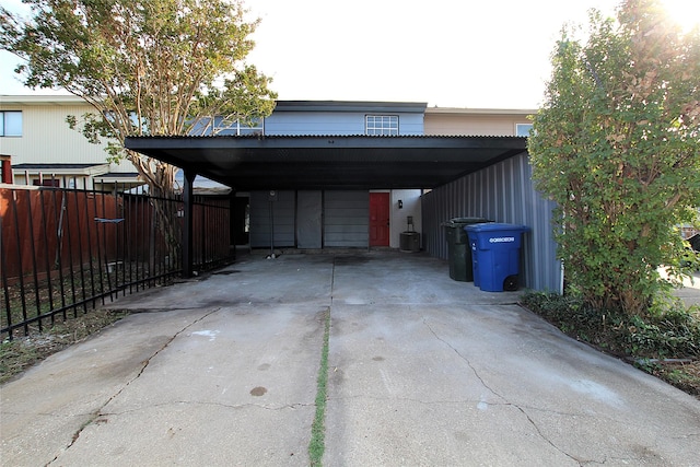 2202 Statler Dr, Carrollton, TX 75007 - view of vehicle parking featuring concrete driveway and a carport