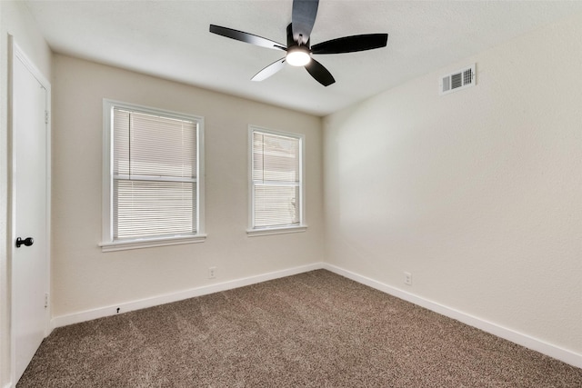 1628 Florence St, Arlington, TX 76010 - spare room featuring carpet, a ceiling fan, and baseboards