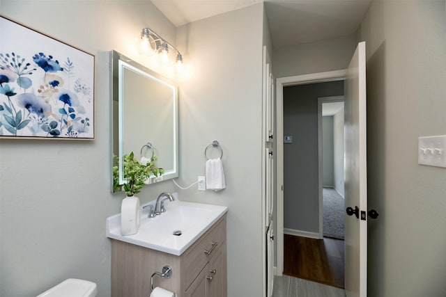 620 Admiralty Way, Fort Worth, TX 76108 - half bath featuring vanity, toilet, and wood finished floors
