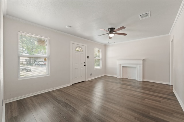 2806 W 8th St, Dallas, TX 75211 - unfurnished living room with a ceiling fan, dark wood-style floors, crown molding, baseboards, and a fireplace