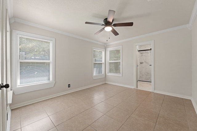 2806 W 8th St, Dallas, TX 75211 - empty room featuring a ceiling fan, light tile patterned flooring, baseboards, and ornamental molding