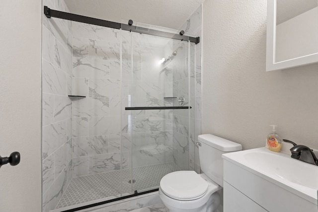 2806 W 8th St, Dallas, TX 75211 - bathroom featuring a shower stall, toilet, marble look tiles, vanity, and a textured wall