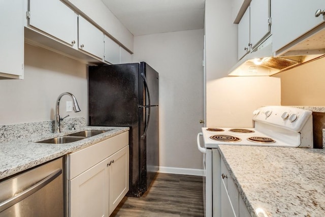 8110 Skillman St Unit 2054, Dallas, TX 75231 - kitchen featuring white electric stove, stainless steel dishwasher, dark wood finished floors, freestanding refrigerator, and white cabinets
